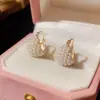 Pendientes de perlas creativos personalizados Dongdaemun de Corea del Sur, elegante diseño en forma de U, hebilla de oreja, nuevos pendientes simples, venta al por mayor