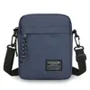 Bolso cruzado vertical pequeño para hombre, bolsa de hombro tipo bandolera ligera de tela Oxford con decoración de etiqueta y correa ajustable para el trabajo diario y viajes
