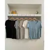 Camiseta básica versátil casual de punto elástico, manga corta, hombro regular, tacto frío de Lyocell, corte ajustado