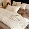Conjunto de quatro peças de leite veludo espesso novo para o Inverno 2025, fleece de dupla face de veludo coral, capa de edredom e lençol de cama quentes de pelúcia