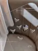 Nuevo Aleación de Arco Joyería para Uñas Líquidas Luz Destellante Diamante de Lujo Luna Mariposa Decoración de Uñas Taladro Al por Mayor