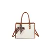 Bolsa de Mão Europeia e Americana com Bloqueio de Cores em Relevo para Mulheres 2026 Nova Bolsa Tote para o Dia a Dia de Primavera/Verão Bolsa Transversal Estilosa para Mulheres