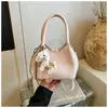 Bolsa de Mão de Luxo para Mulheres, Nova Tendência de Moda Primavera/Verão 2026 Exquisita Ultra-Popular Bolsa de Ombro Cruzada Estilo Balde