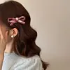 Pinza Lateral para el Cabello con Lazo Rojo Estilo Coreano Ambiente Navideño Otoño e Invierno 2025 Pinza Elegante de Gama Alta para el Flequillo
