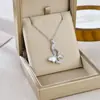Nuevo producto transfronterizo: Cadena de clavícula elegante y versátil de lujo ligero con incrustaciones de microdiamantes, collar de acero de titanio, accesorio de joyería que no se decolora