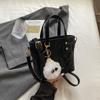 Bolso pequeño popular de este año para mujer 2025 primavera nueva moda bolso bandolera de hombro tendencia de textura bolso de cubo portátil