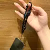 Ins Desenho Animado Feito à Mão Case de Celular com Contas Corrente para Pendurar Chaveiro Pulseira DIY Pingente de Mochila Câmera CCD Anti-Perda D