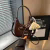 Bolso para mujer con diseño de nicho estilo coreano 2026 nueva moda primavera-verano bolso cruzado simple bolso de mano exquisito bolso tote pequeño