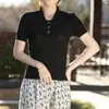 Estilo nuevo de verano algodón puro cuello camisero casual manga corta tejido calado moda torsión delgado corte ajustado camiseta top para mujer