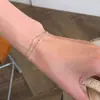 Pulsera de hueso de serpiente con cuentas plateadas de doble capa, estilo minimalista coreano, versátil para el uso diario, exquisitamente diseñada y con un toque sofisticado y de alta gama; venta al por mayor de cadenas delicadas