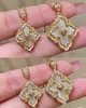 Collar de Esmalte Blanco de Alta Gama con Nácar, Chapado en Oro de 18K Cobre y Colgante de Trébol de Cuatro Hojas con Incrustaciones de Diamantes, Accesorio para Mujer para Comercio Transfronterizo