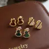Brincos Casuais Retrô Elegantes de Concha com Zircônia Microcravejada Design de Luxo Acessível Brincos de Ponta Nicho