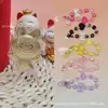 Colgante de oro Labubu 999 de oro puro, serie de melocotón con corazón de Sanrio, cordón de regalo promocional, artículo popular para atraer clientes