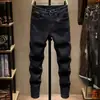 Jeans negros de alta gama de moda para hombre, corte slim, pierna estrecha, nuevo estilo de verano moderno, elásticos, lavados, versión coreana, pantalones largos para hombre