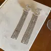 Pendientes minimalistas de plata con aguja, diamantes y borlas, que ofrecen un lujo ligero y una sensación de alta gama, elegantes y sencillos, versátiles y elegantes.