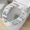 Funda para asiento de inodoro, tipo adhesivo, para uso doméstico, impermeable, adecuada para otoño e invierno, diseño ligero y lujoso, almohadilla de felpa a rayas engrosada para asiento de inodoro