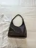 Bolso de Axila de Gama Alta para Mujer 2026 Nuevo Popular Moda para el Trabajo Textura Tejida Retro Bolso de Hombro Único Madre e Hijo Transfronterizo