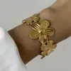 Pulseras Nuevas Transfronterizas Europeas y Americanas Acero Inoxidable Versátil Moda Oro Irregular Hueco Versión Ancha Joyería para Mujer