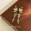 Pendientes de pétalos vintage de estilo antiguo medio, pendientes de nicho de alta gama, pendientes vintage de moda con temperamento, venta al por mayor para mujeres