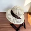 Sombrero de paja hueco elegante y sofisticado estilo francés para mujer, sombrero tipo cubo pantalla de lámpara de verano para vacaciones en la playa con ala ancha para protección solar