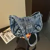 Bolso de mano de mezclilla versátil de moda transfronterizo 2026 nuevo casual simple de alta gama para hombro cruzado