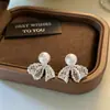 Pendientes de Botón de Encaje Hueco con Lazo y Perlas de Diseño Francés, Super Hada, Lujo Ligero, Sensación de Alta Gama, Versátiles y Dulces