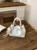 Bolso Cubo Versátil de Mano para Mujer de Comercio Exterior, Nueva Moda Primavera 2025 Bolso de Hombro Versátil con Acabado de Alta Gama, Bolso Cruzado