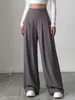 Calça social feminina de cintura alta, perna larga, estilo europeu e americano, em V, plissada, com caimento fluido, modelagem solta, comprimento até o chão, exclusiva para exportação.