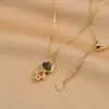 Cadena para clavícula elegante con baño de oro real, diseño de nicho femenino, collar de astronauta, collar de personalidad hip hop, joyería al por mayor