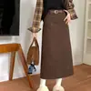 Falda midi de pana retro de cintura alta, adelgazante para mujer, con un diseño elegante que cubre las caderas, una silueta recta en A y un corte que se ajusta al cuerpo.