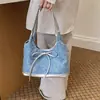 Bolsa jeans feminina 2026 nova tendência moda bolsa de ombro única bolsa tote de grande capacidade para escola e trabalho