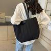 Bolsa Feminina de Grande Capacidade com Aparência Sofisticada 2025 Primavera Nova Moda Pasta Simples Roupa de Trabalho Versátil Lona Tote Bag de Ombro Único