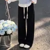 Elegante y a la moda, este adorable conjunto de chaleco y blusa con cuello de muñeca de estilo coreano es perfecto para usar en capas y crear un look casual para niñas.
