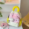 Nueva mochila infantil de estilo coreano con bloques de color, moderna y de gran capacidad, adecuada tanto para niños como para niñas, linda bolsa de mano para estudiante de primaria