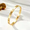 Conjunto de três peças transfronteiriço europeu e americano mais vendido de pulseiras de aço inoxidável com fecho geométrico, pulseiras empilháveis para mulheres com banho a vácuo 18k