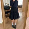 Nuevo falda midi versátil de lunares abombada vintage de otoño con botones y diseño único