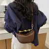 Bolso pequeño de alta gama de nicho para mujer 2026 nueva moda casual bandolera cruzada bolso de media luna versátil bolso tipo empanada