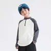 La nueva colección de invierno de Haimei para niños: Camiseta de manga larga de invierno 2026, capa base térmica con protección solar, ropa infantil de moda