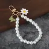 Nuevo colgante de llavero de coche de perlas, lindo accesorio para fundas de auriculares, decoración de bolso, accesorio de cadena colgante para equipaje para mujeres