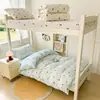 Lindo juego escolar de tres piezas de dibujos animados para literas en dormitorios, juego de tres piezas para cama individual de algodón acolchado, kit estudiantil transfronterizo
