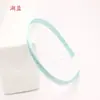 Diadema para el pelo de color caramelo de 1 cm de grosor Accesorios para el pelo DIY Diadema fina de satén Venta directa de fábrica