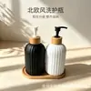 Botellas de gel antibacterial de colores, botellas dispensadoras de loción y gel de ducha para hoteles transfronterizos, botellas de champú de rayas verticales, botellas de vidrio