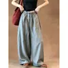 ¡Muy recomendable! Pantalones grises de corte holgado, fluidos y de pierna curva para mujer, perfectos para otoño, con un estilo chic y relajado sin esfuerzo, y un efecto favorecedor y adelgazante.