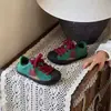 Zapatillas infantiles con puntera de concha 2026 nuevos modelos primavera y otoño zapatos de niña zapatillas de entrenamiento alemanas zapatillas deportivas transpirables para niño estrella