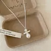 Colar Pingente Oval de Prata para Mulheres, Novo Estilo 2026, Corrente de Clavícula Relaxada e Sofisticada, Acessório de Corrente Longa para Pescoço