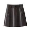 Pantalones cortos de mujer sencillos y elegantes 2026 otoño e invierno nueva tendencia ropa exterior pantalones de falda de cuero elegantes para la oficina pantalones de falda de pierna ancha línea A