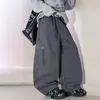 Ropa infantil pantalones de otoño para niños 2026 nuevo estilo ropa de trabajo otoño casual pantalones largos para niños mayores primavera y otoño estilo moderno