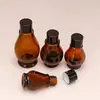 Botella gotero con forma de calabaza individual en stock 30 ml Botella de vidrio para aceites esenciales 10 ml Botella dispensadora de doble cabezal de bola rodante para loción corporal 5 ml