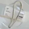 Collar de perlas de plata de ley 925 para mujer, sensación de lujo ligero de nicho de alta gama, estilo de celebridad de internet de moda, collar de perlas Swarovski