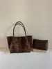 Bolso tote de mano transfronterizo nuevo con estampado de leopardo para mujer, nueva moda 2026, texturizado, retro, bolso de hombro de nicho, bolso de axila